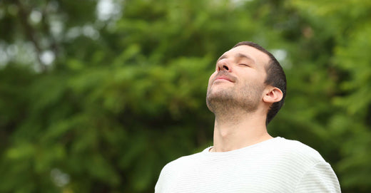 man breathing outside