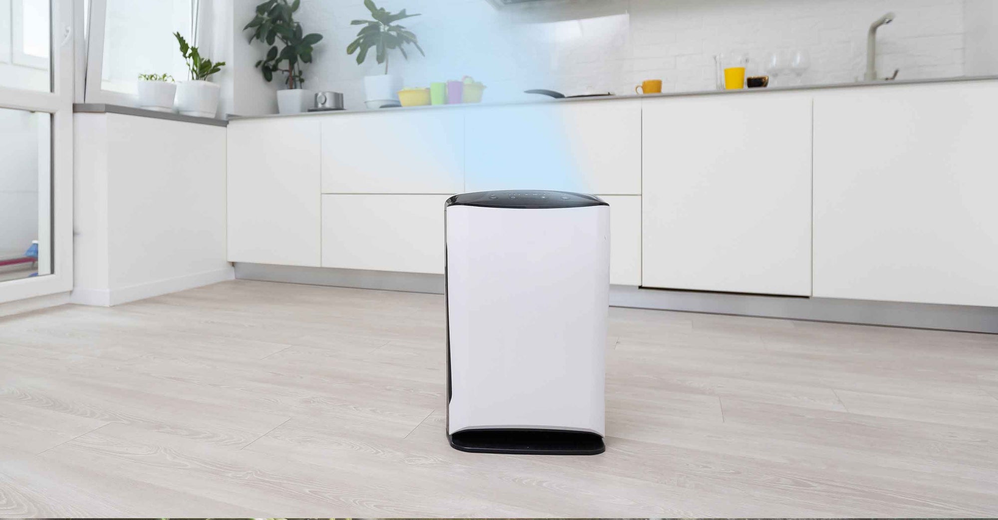 Ionizer air purifier on kitchen floor