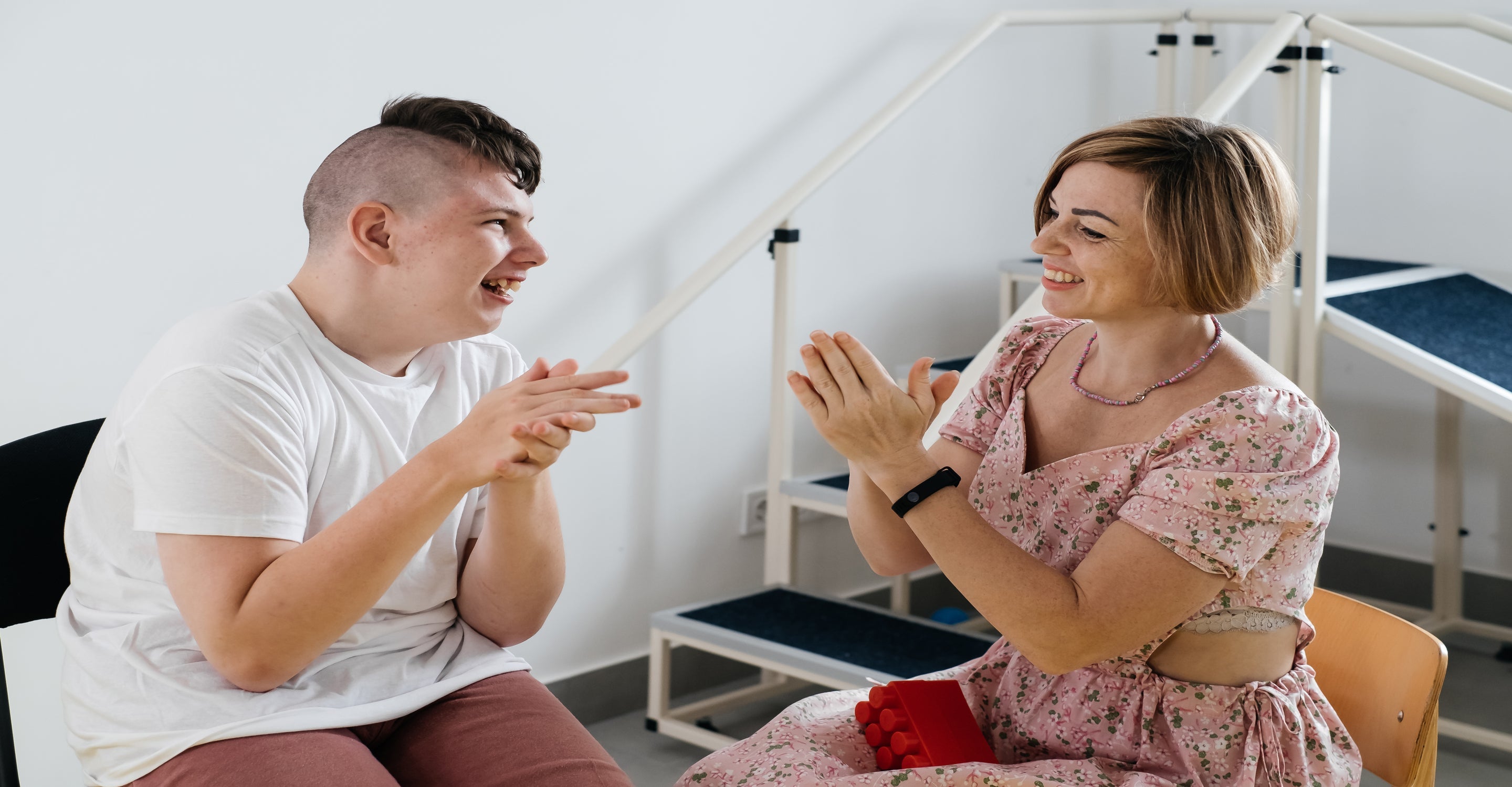 Boy and mother smiling