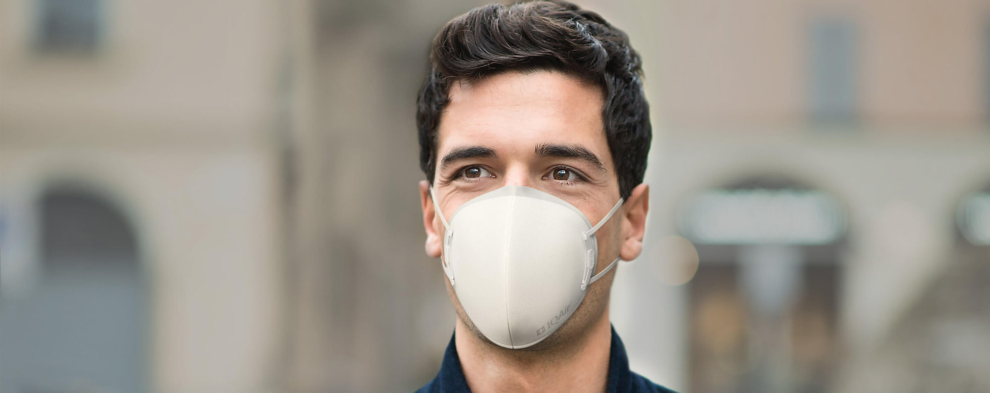 Man with IQAir mask