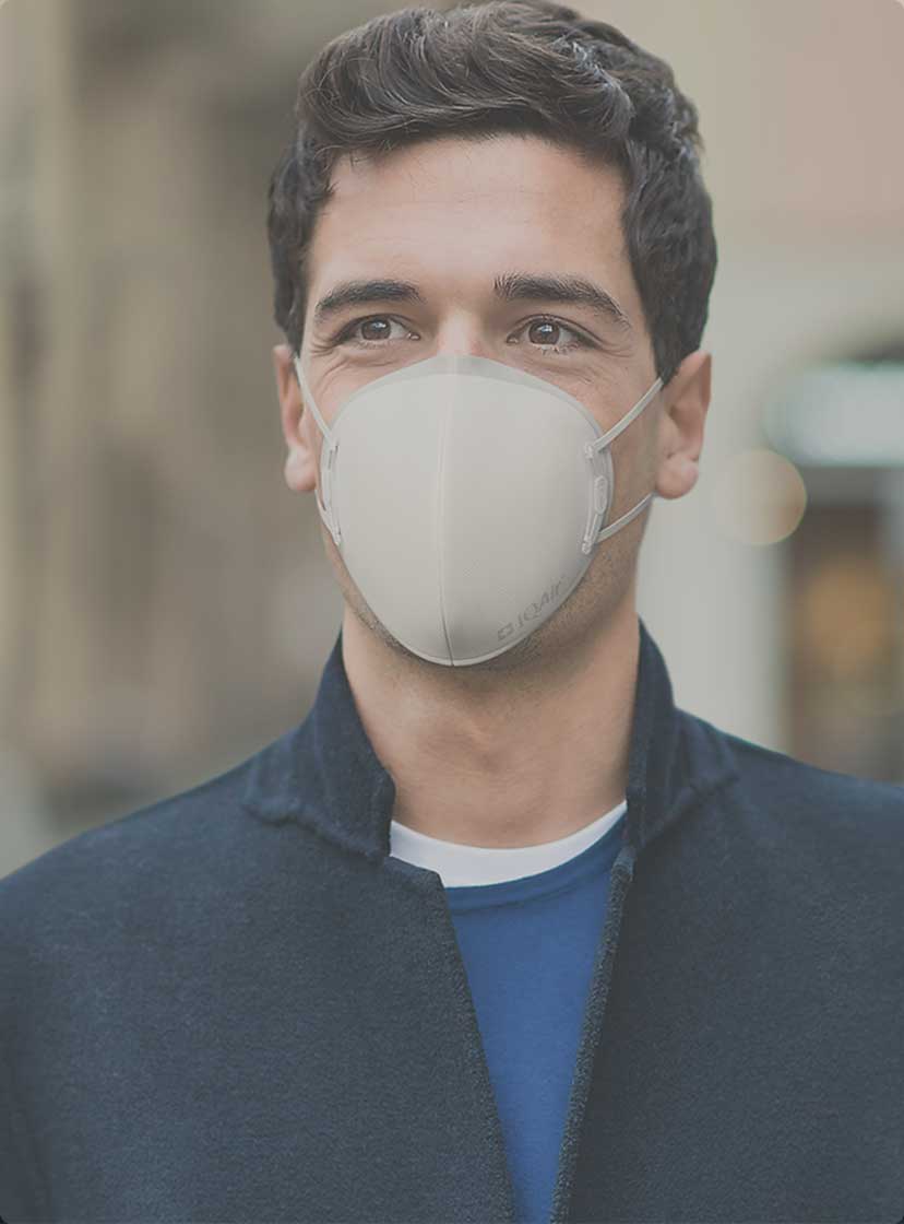 man with IQAir mask